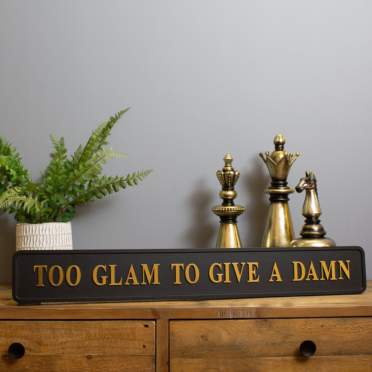 Too Glam To Give A Damm Street Sign